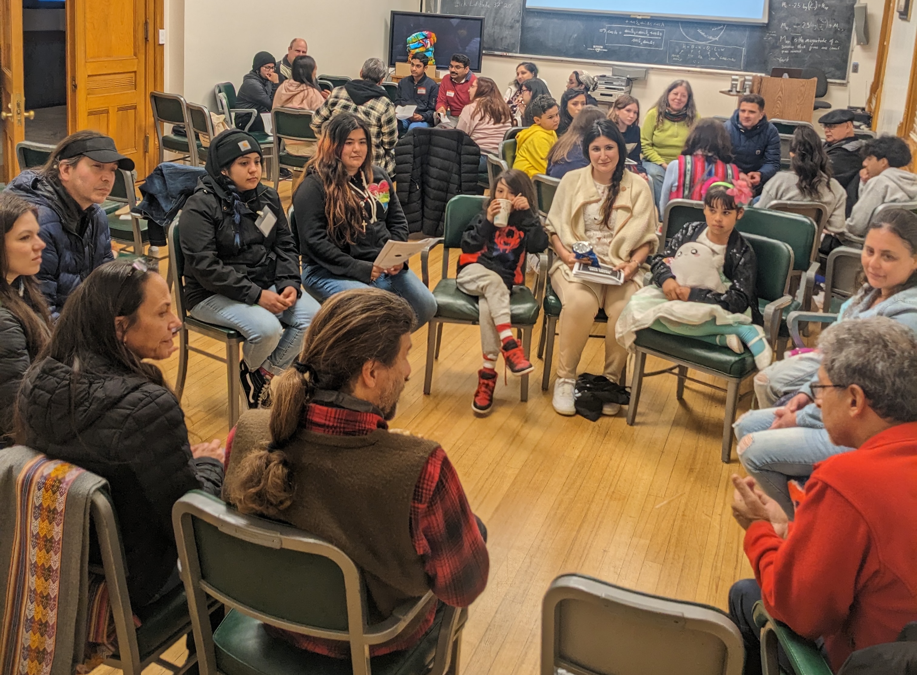 Participants sit in circles sharing star stories at the inaugural Native Star Stories Night.